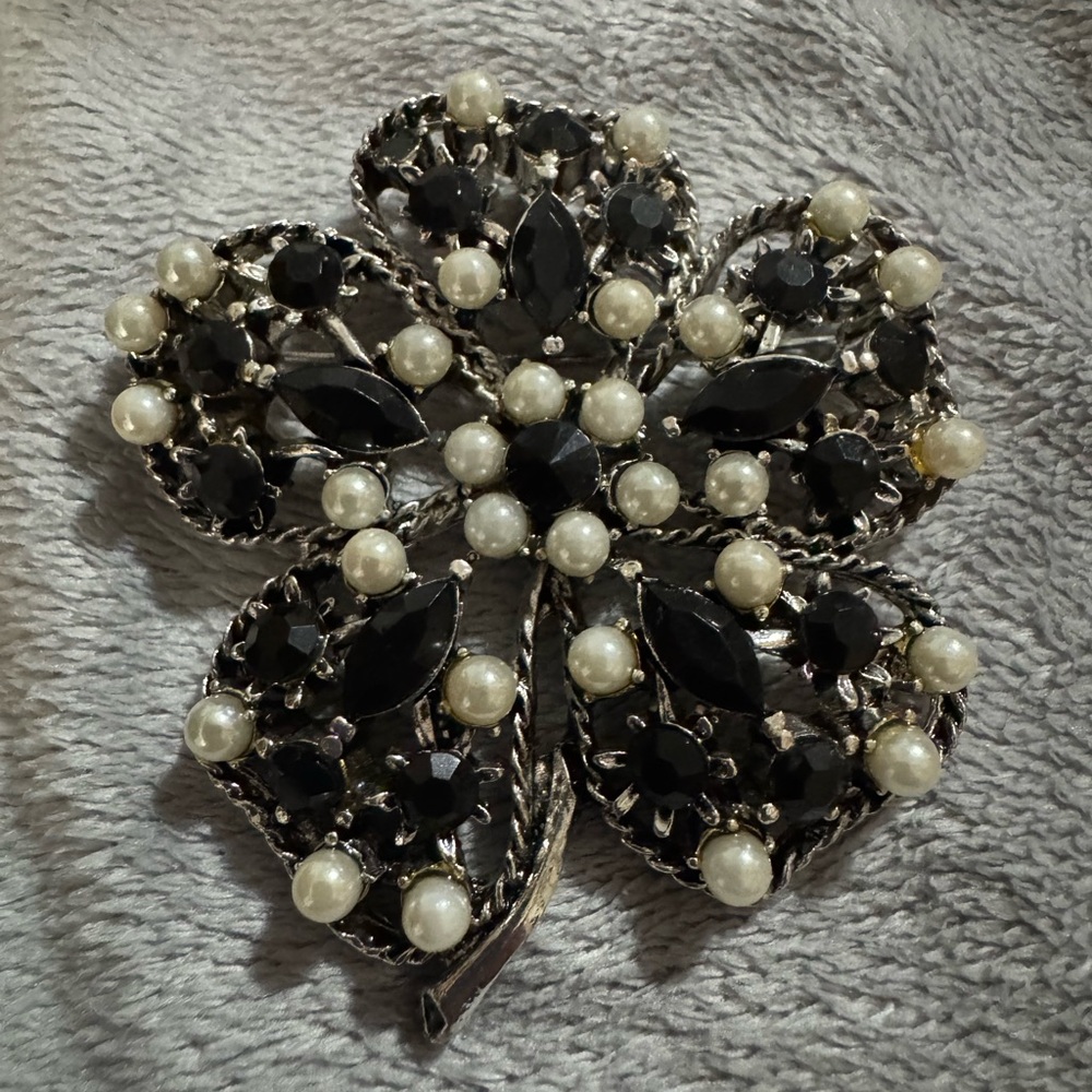 Elegant Black and Silver Floral Brooch